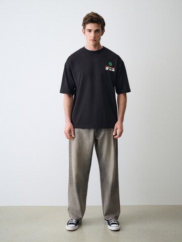 T-Shirt Next en noir