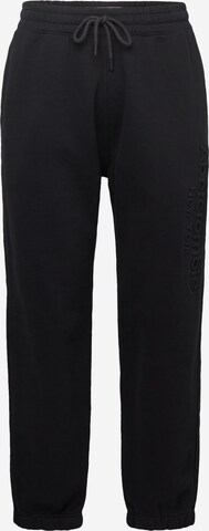 Abercrombie & Fitch Tapered Pants 'EMEA-EX' in Black: front