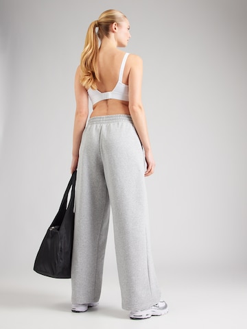 UNDER ARMOUR Wide Leg Sporthose in Grau