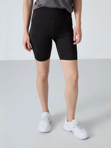 Tommy Life - Tapered Leggings 'Gamaschen' em preto