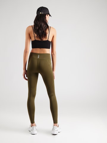 UNDER ARMOUR Skinny Παντελόνι φόρμας 'Fly Fast 3.0' σε πράσινο