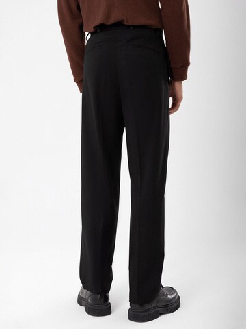 Antioch Regular Pleat-front trousers in Black