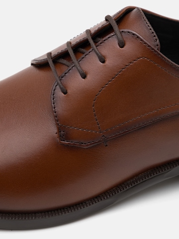BOSS Buty sznurowane 'Tayil' w kolorze brązowy