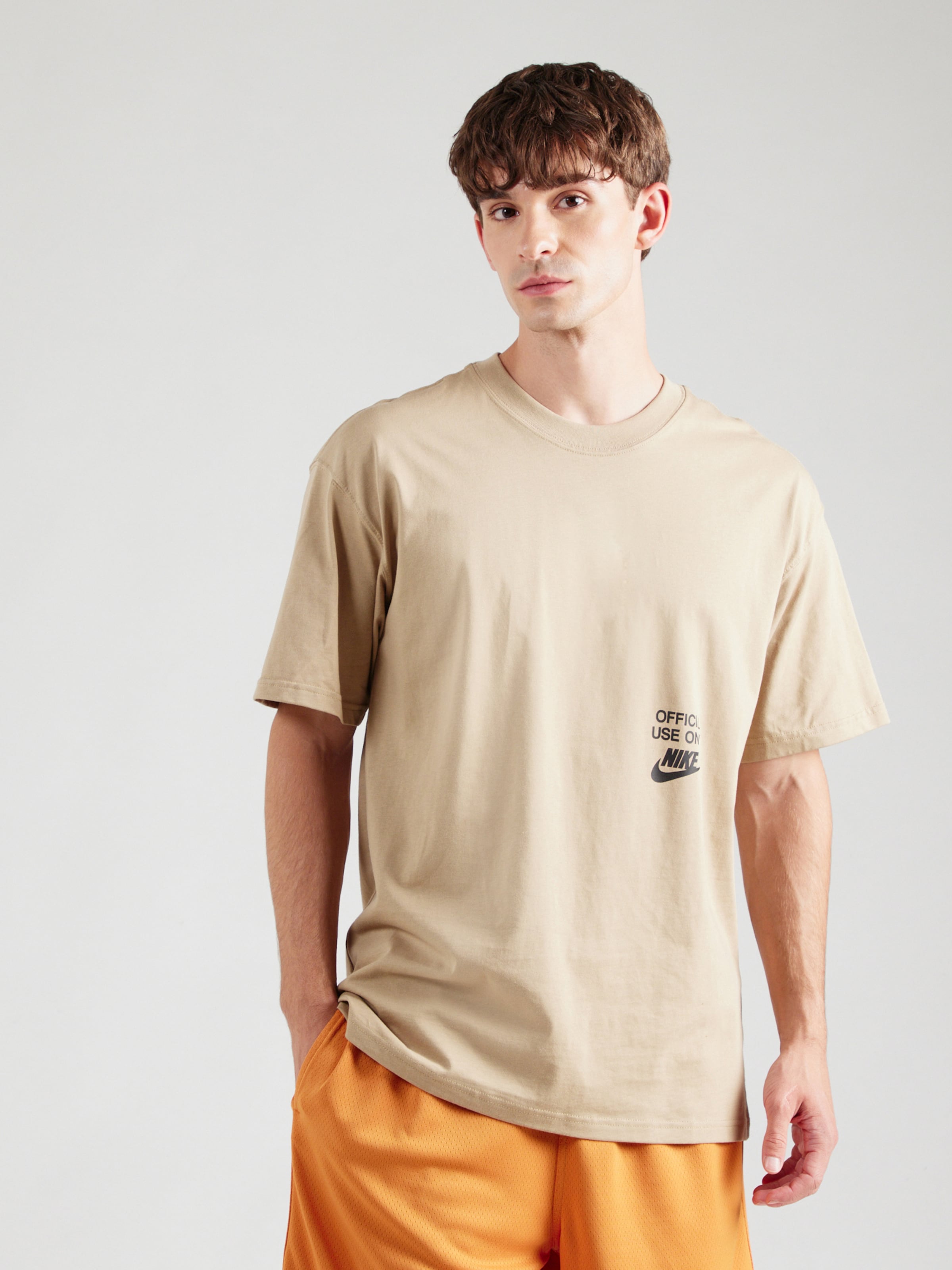 beige nike shirt
