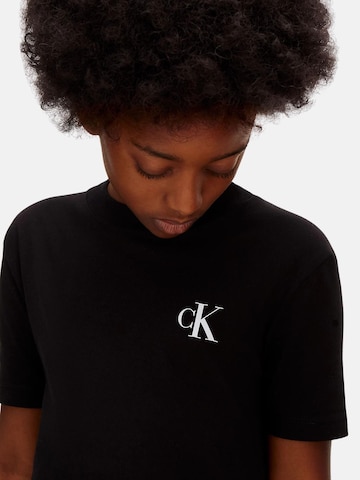 Calvin Klein Kids Shirt 'CALVIN KLEIN  JEANS kids CHEST MONO LOGO SS T-SHIRT T-SHIRT' in Zwart