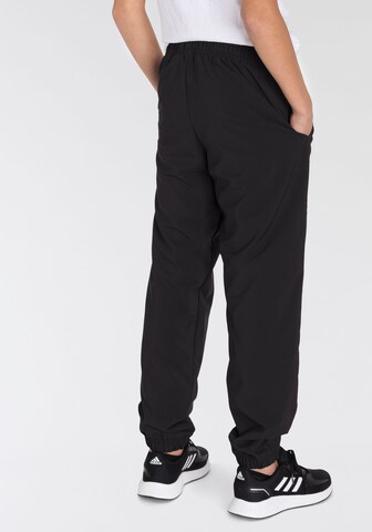 ADIDAS SPORTSWEAR Tapered Workout Pants 'Essentials French Terry' in Black