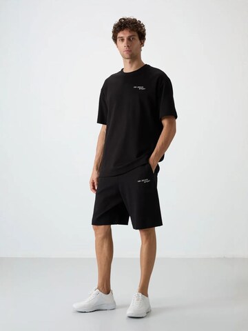 Tommy Life Sports suit in Black: front