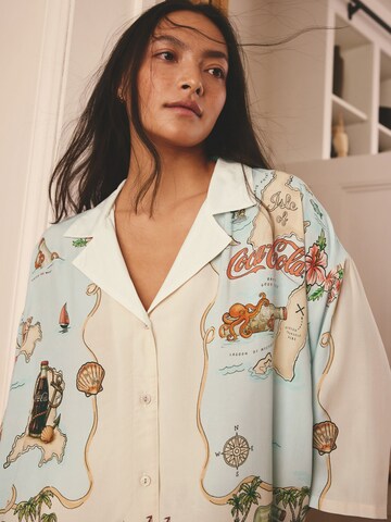 Shorty 'Coca Cola' di Next in blu