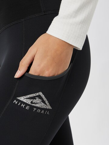 NIKE Skinny Sportbroek 'Epic Luxe' in Zwart