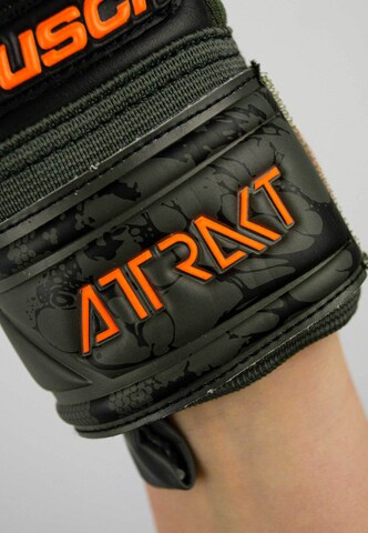 REUSCH Athletic Gloves 'Attrakt Grip Evolution Finger Support' in Black