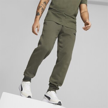 PUMA Tapered Sportbroek in Groen