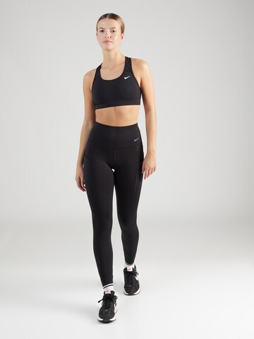 NIKE Skinny Spodnie sportowe 'Universa' w kolorze czarny