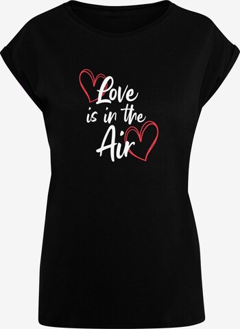 Merchcode T-Shirt 'Valentines Day - Love Is In The Air' in Schwarz: predná strana