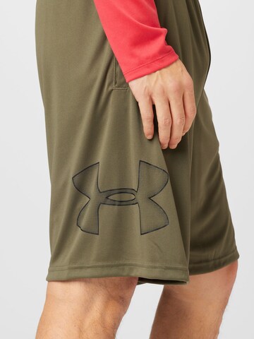 UNDER ARMOUR Lużny krój Spodnie sportowe w kolorze zielony