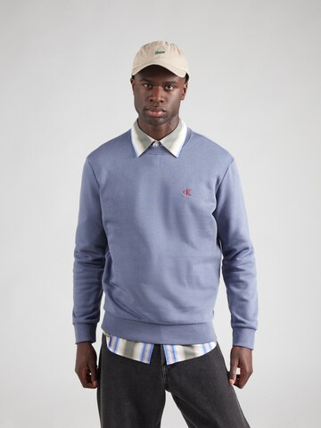 Sweat-shirt Calvin Klein Jeans en gris : devant