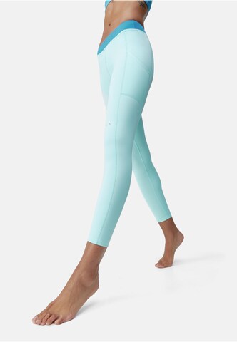 Born Living Yoga Skinny Sportbroek 'Xenia' in Blauw: voorkant