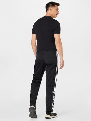 ADIDAS ORIGINALS Regular Housut 'BREAK' värissä musta