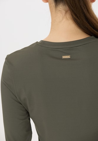 Athlecia Functioneel shirt 'Almi' in Bruin