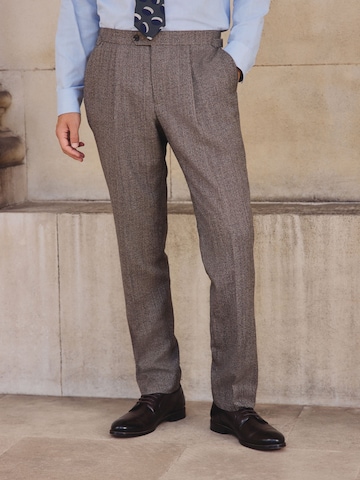 Next Tapered Pleat-Front Pants in Beige: front