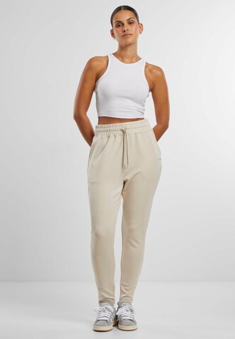 Effilé Pantalon de sport Aim'n en beige
