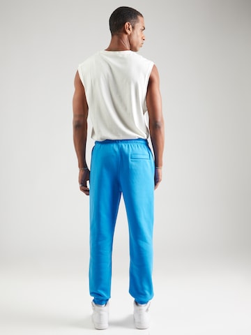 Nike Sportswear Tapered Nadrág 'CLUB' - kék