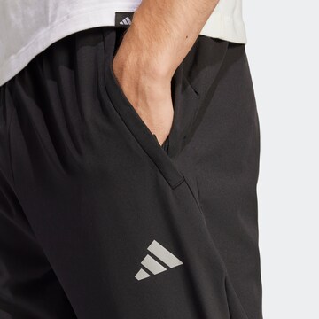 ADIDAS SPORTSWEAR Tapered Sportbyxa i svart