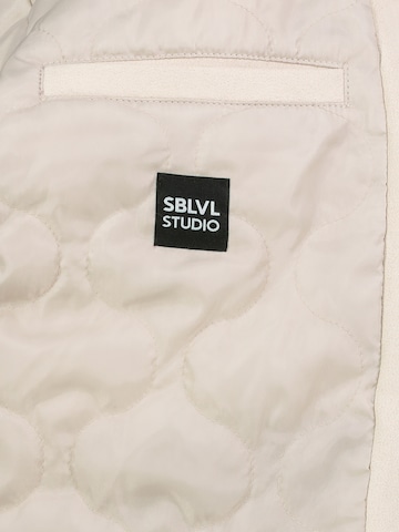 Sublevel Tussenjas in Beige