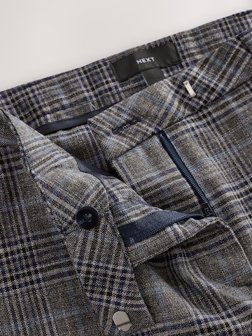 Slimfit Pantaloni di Next in grigio
