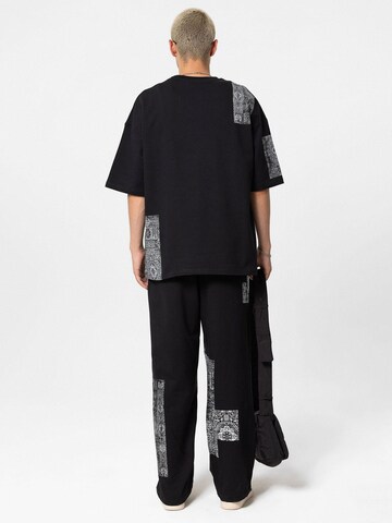 Loosefit Pantaloni 'Wax Plant' di VAMOS CLO in nero