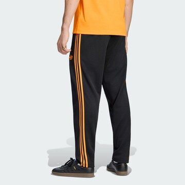 ADIDAS PERFORMANCE Tapered Παντελόνι φόρμας 'Ajax Amsterdam' σε μαύρο