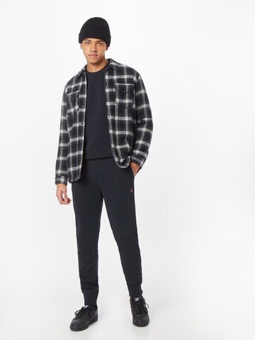Tapered Pantaloni 'Malis' di NAPAPIJRI in nero