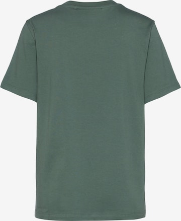 PEAK PERFORMANCE Shirt in Green
