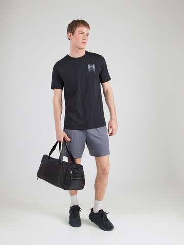 UNDER ARMOUR Performance Shirt in Black