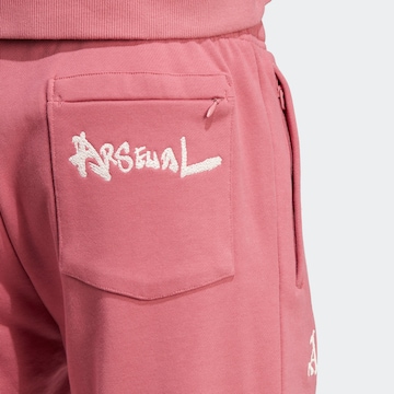 ADIDAS SPORTSWEAR Tapered Workout Pants 'FC Arsenal Chinese Story' in Pink