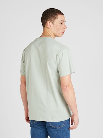 T-Shirt Cleptomanicx en vert