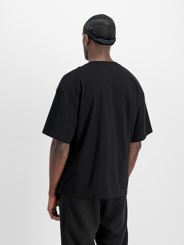 ALPHA INDUSTRIES T-shirt 'Studio Edition' i svart