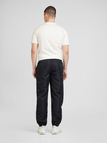 Sergio Tacchini Regular Sportsbukser 'Carson' i svart