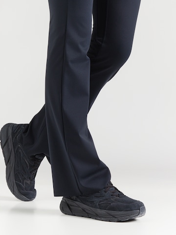 ICANIWILL - Acampanado Pantalón deportivo 'Nimble' en negro