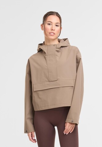 Aim'n Tussenjas in Bruin