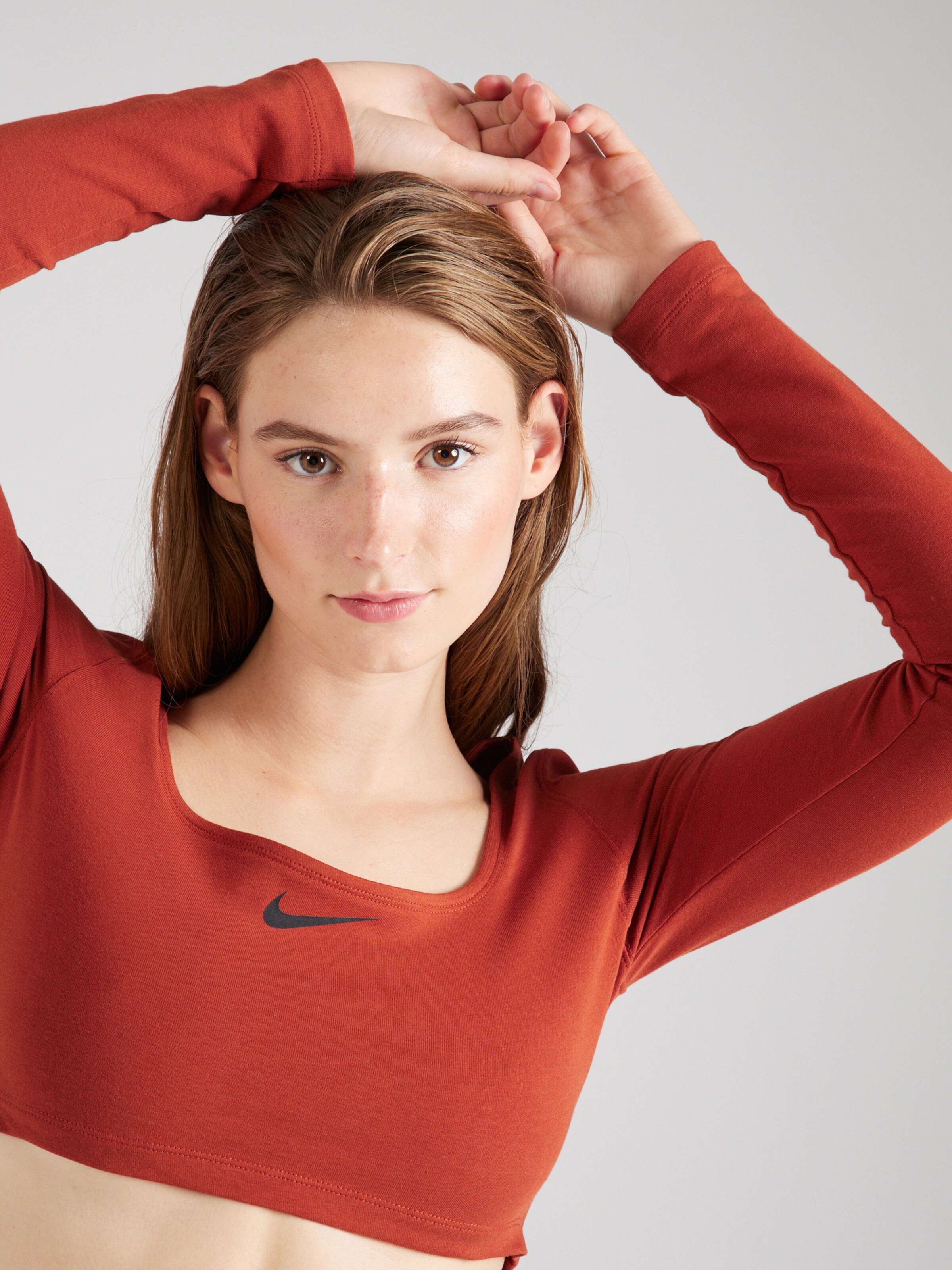 dark orange nike shirt