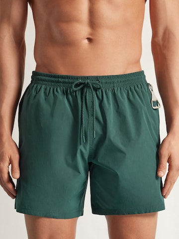 IUMAN Intimissimi Swim Trunks in Green: front