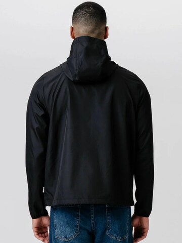 TEESHOPPEN Välikausitakki ' Shell Jacket ' värissä musta