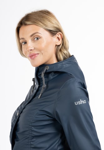 Manteau fonctionnel Usha en bleu