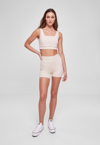 Skinny Pantaloni di Urban Classics in beige