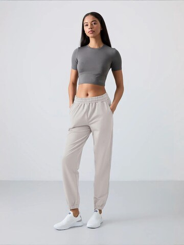 Tommy Life Tapered Nadrág 'Jogginghose' - szürke
