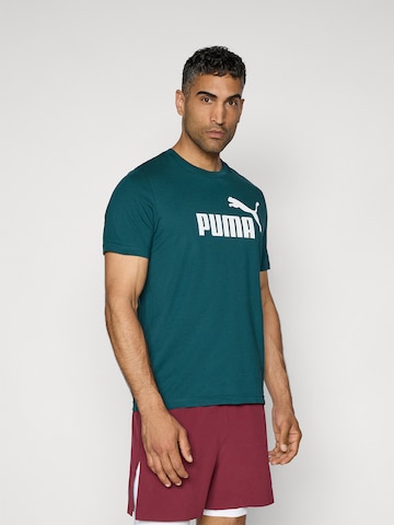 PUMA T-shirt 'Ess No. 1' i grön: framsida