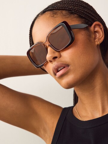 Lunettes de soleil Next en marron : devant