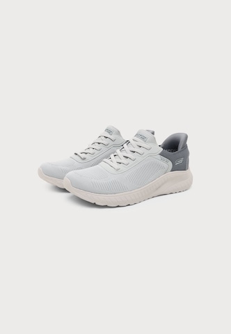 Scarpa slip-on 'BOBS SQUAD CHAOS - CURRENT MU' di SKECHERS in grigio