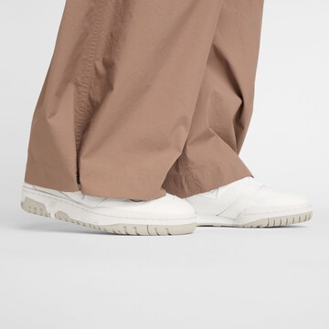 new balance Loosefit Cargobroek 'Woven Cargo Pant' in Bruin