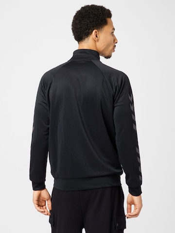 Bluză cu fermoar sport 'LEGACY' de la Hummel pe negru
